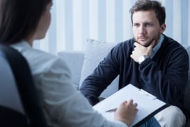 Young man during therapy at psychologists office